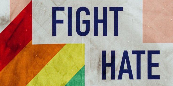 Image: Rainbow with text slogan: Fight Hate 